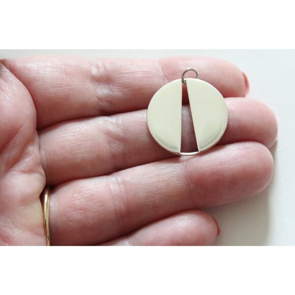 Sterling Silver Circle Pendant with Long Triangle Cutout - Picture 2 of 5